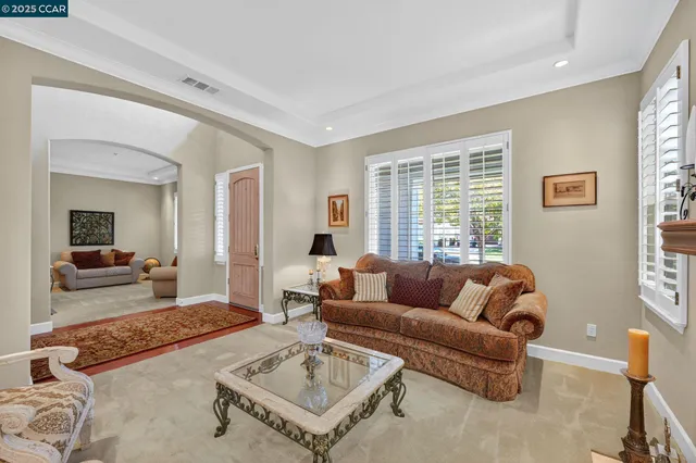 a living room with furniture and a couch