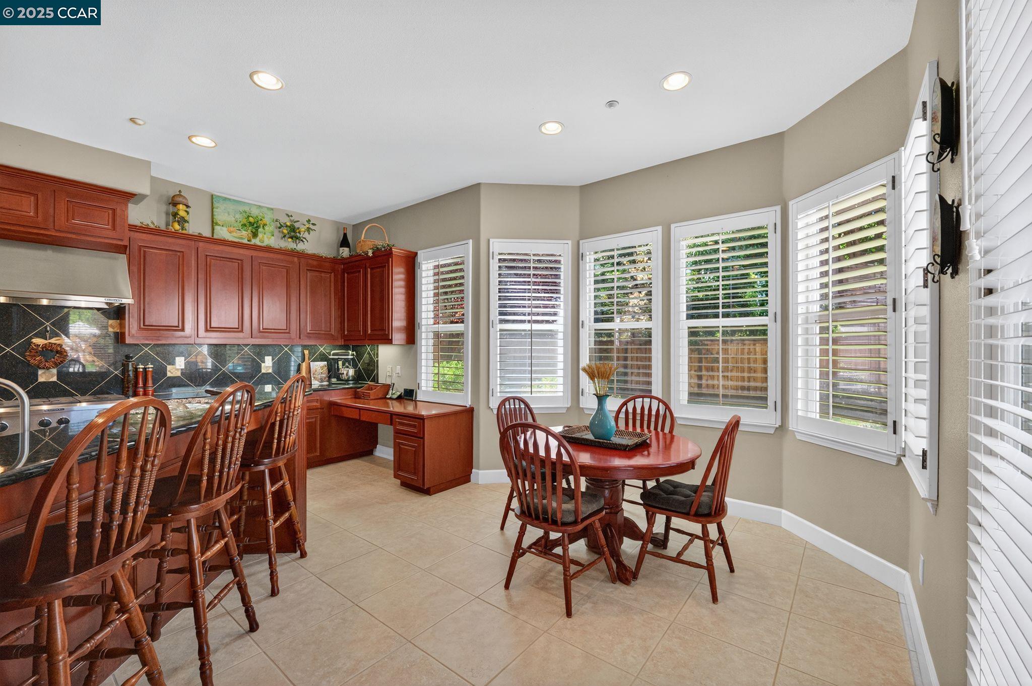 255 Prato Way Livermore, CA 94550 - Photo 19 of 45 a view of a dining room with furniture window and outside view