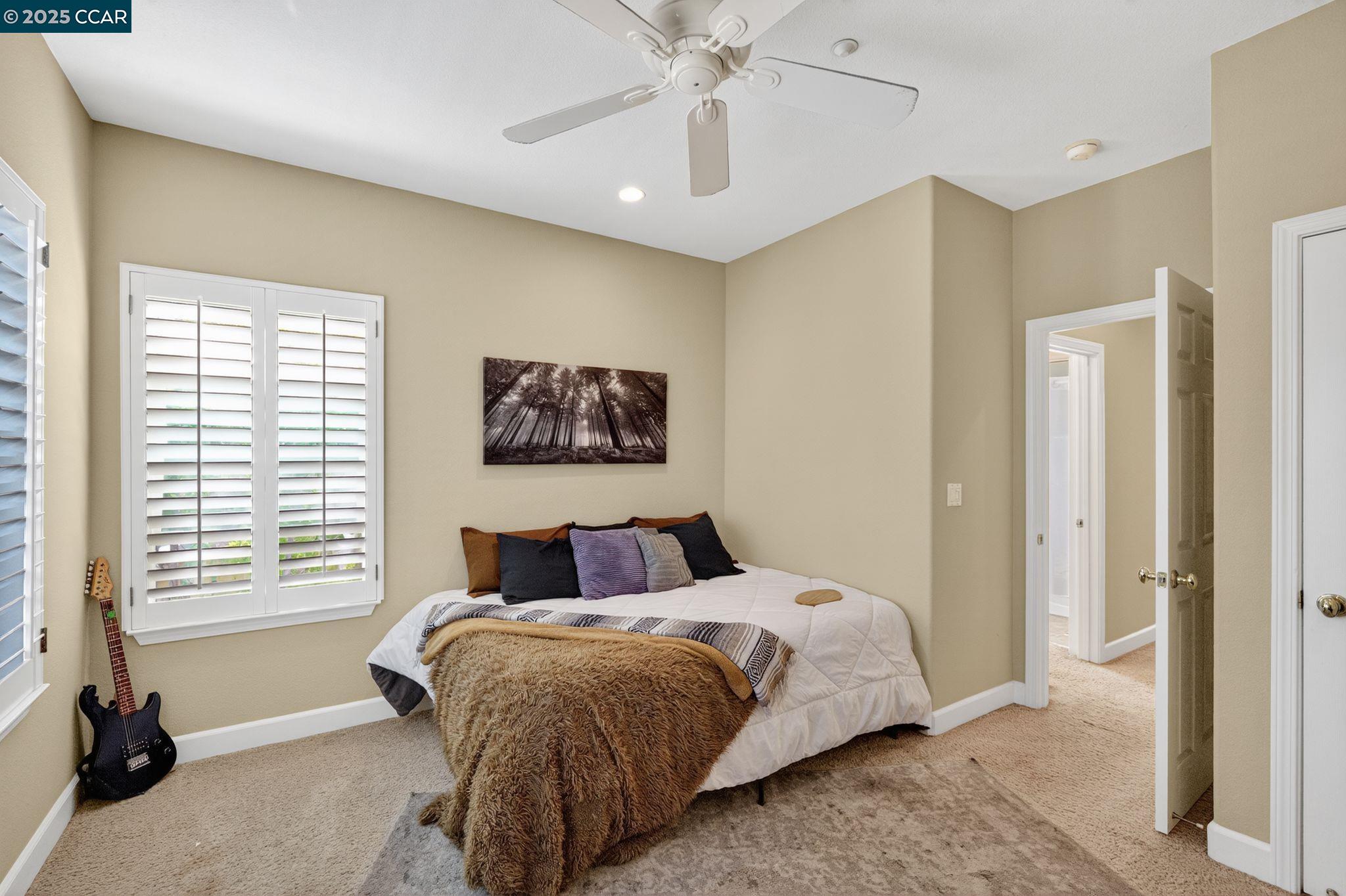255 Prato Way Livermore, CA 94550 - Photo 26 of 45 a bedroom with a bed and a window
