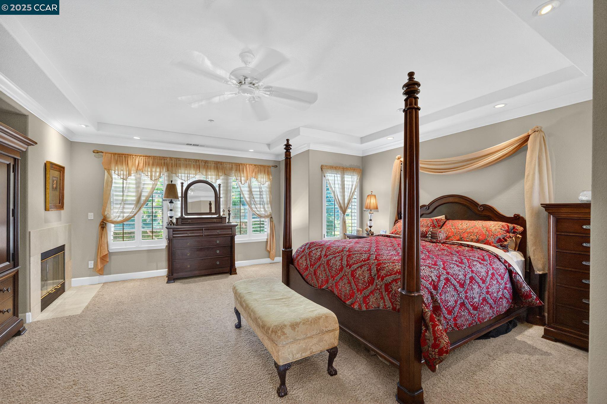 255 Prato Way Livermore, CA 94550 - Photo 29 of 45 a bedroom with a bed and a chandelier