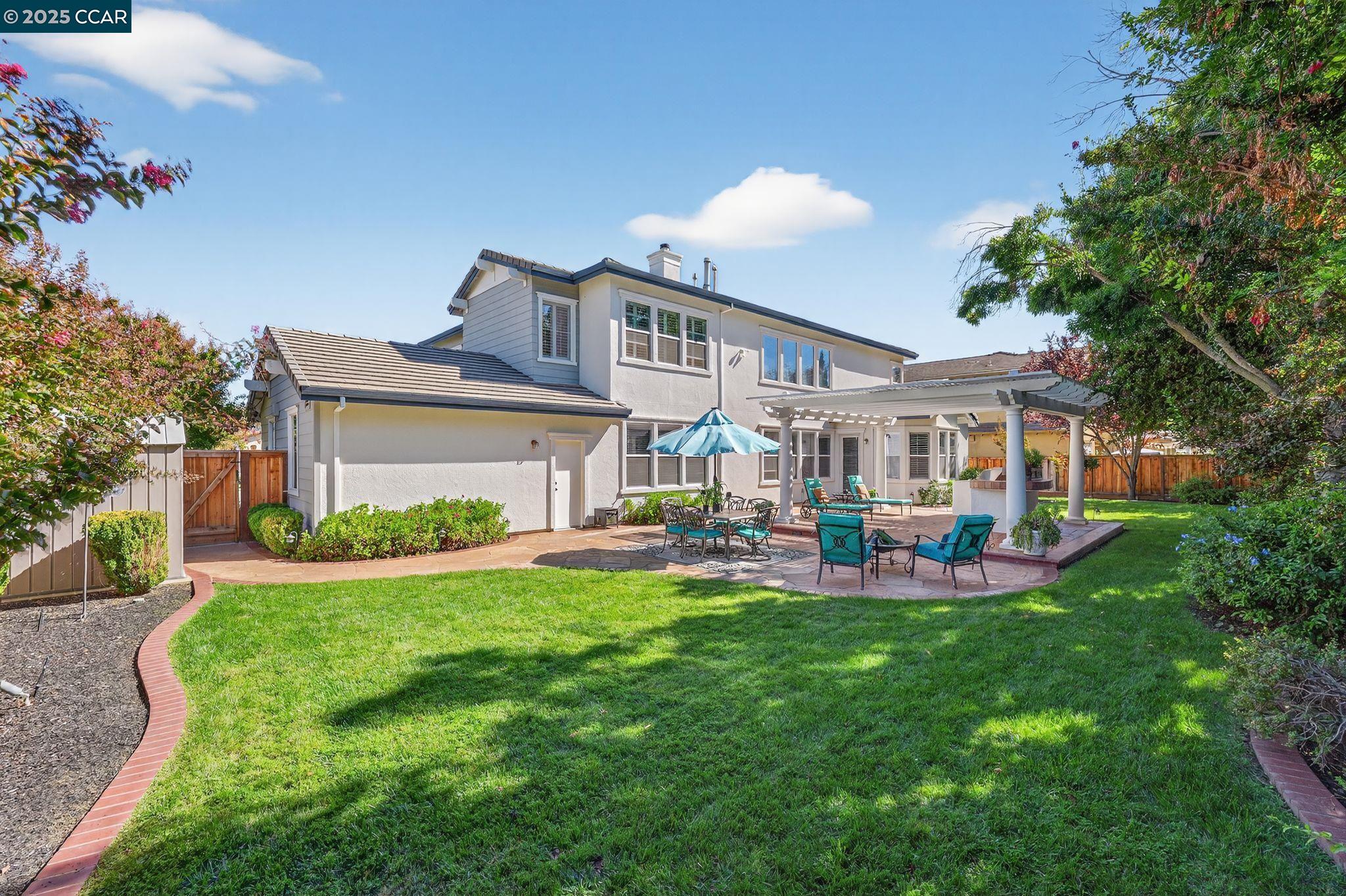 255 Prato Way Livermore, CA 94550 - Photo 38 of 45 a view of a house with a yard and sitting area