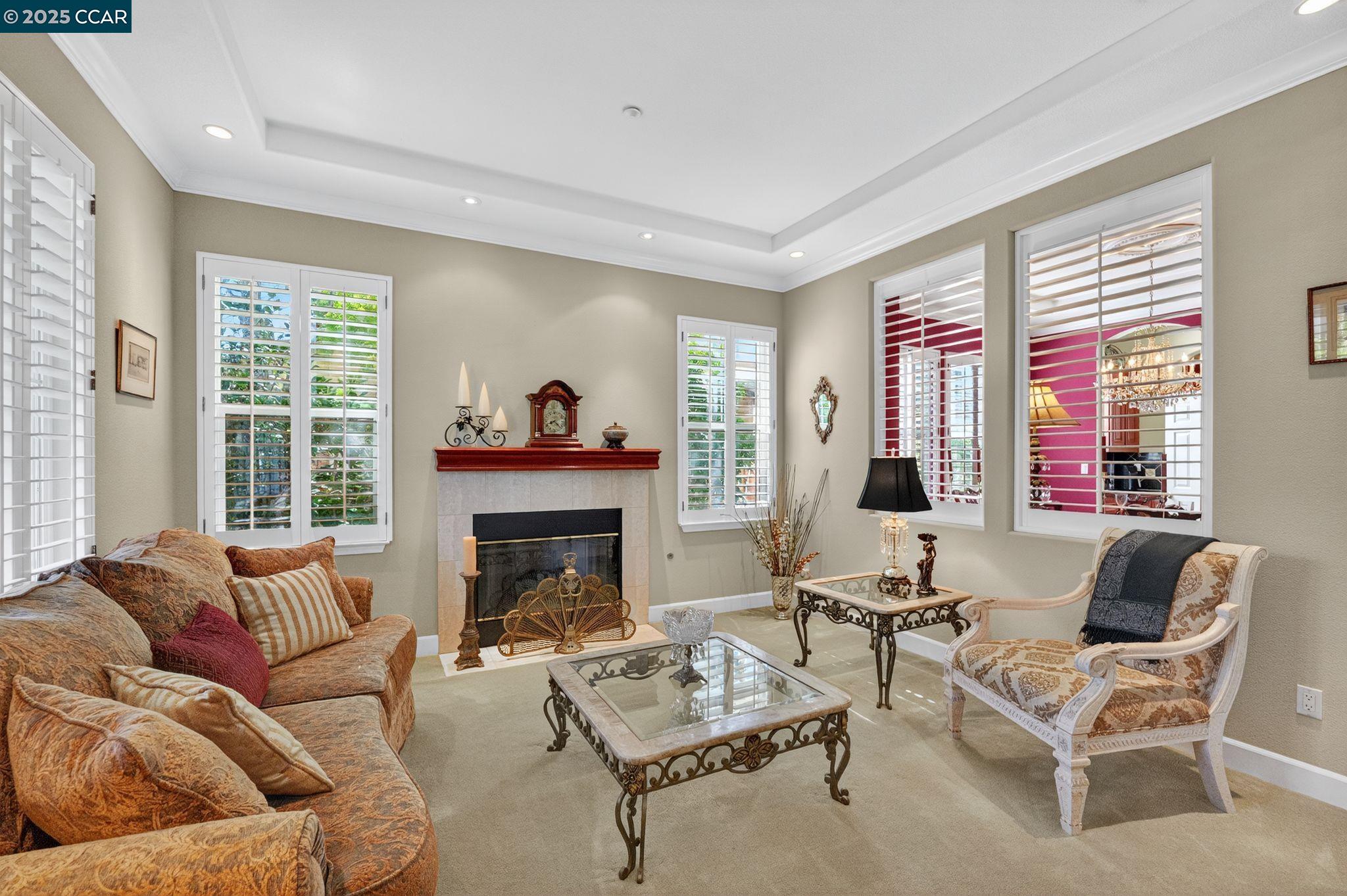 255 Prato Way Livermore, CA 94550 - Photo 7 of 45 a living room with furniture and a fireplace