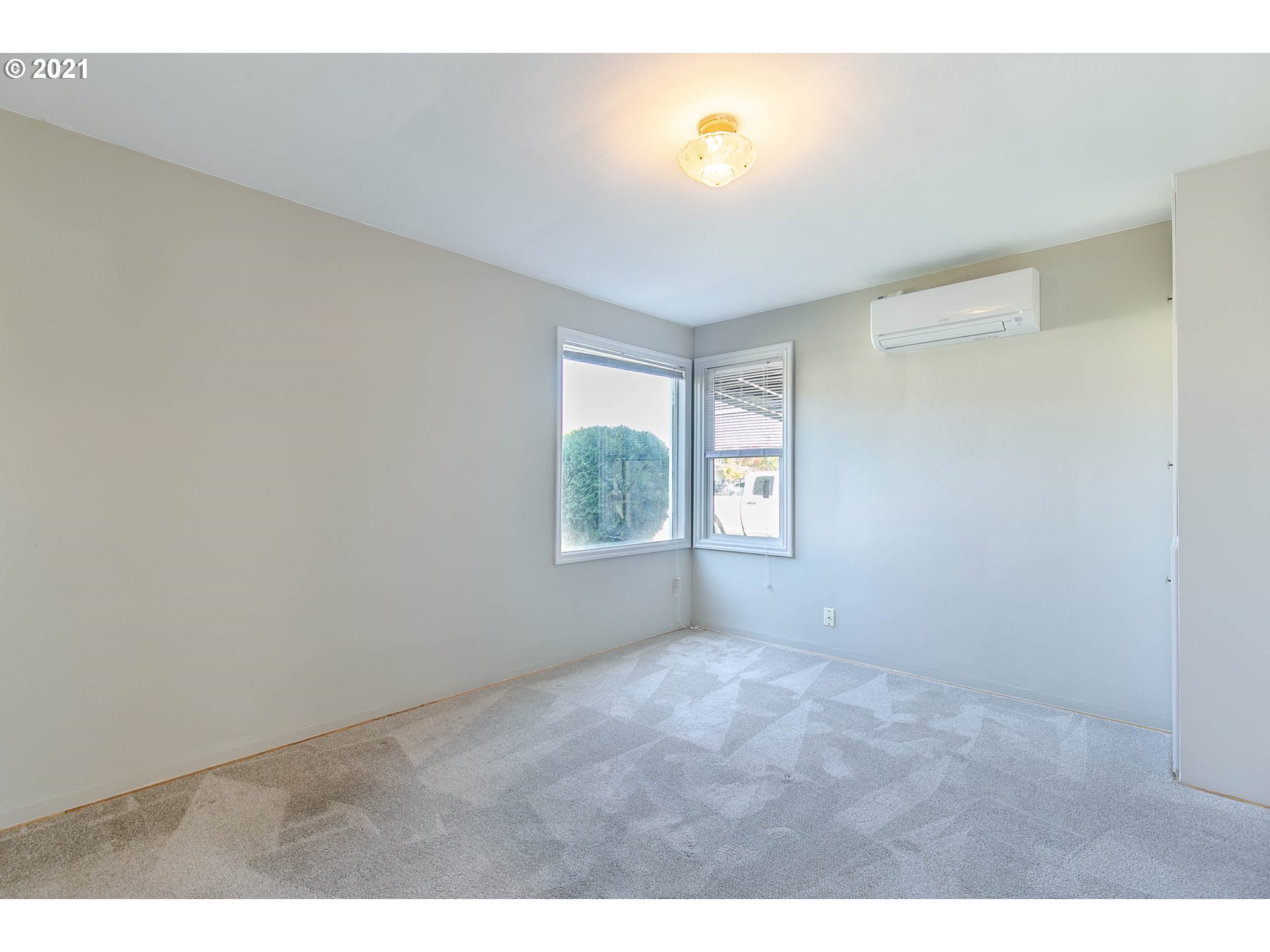 1469 Parker Street Springfield, OR 97477 - Photo 22 of 30 a view of an empty room with a window