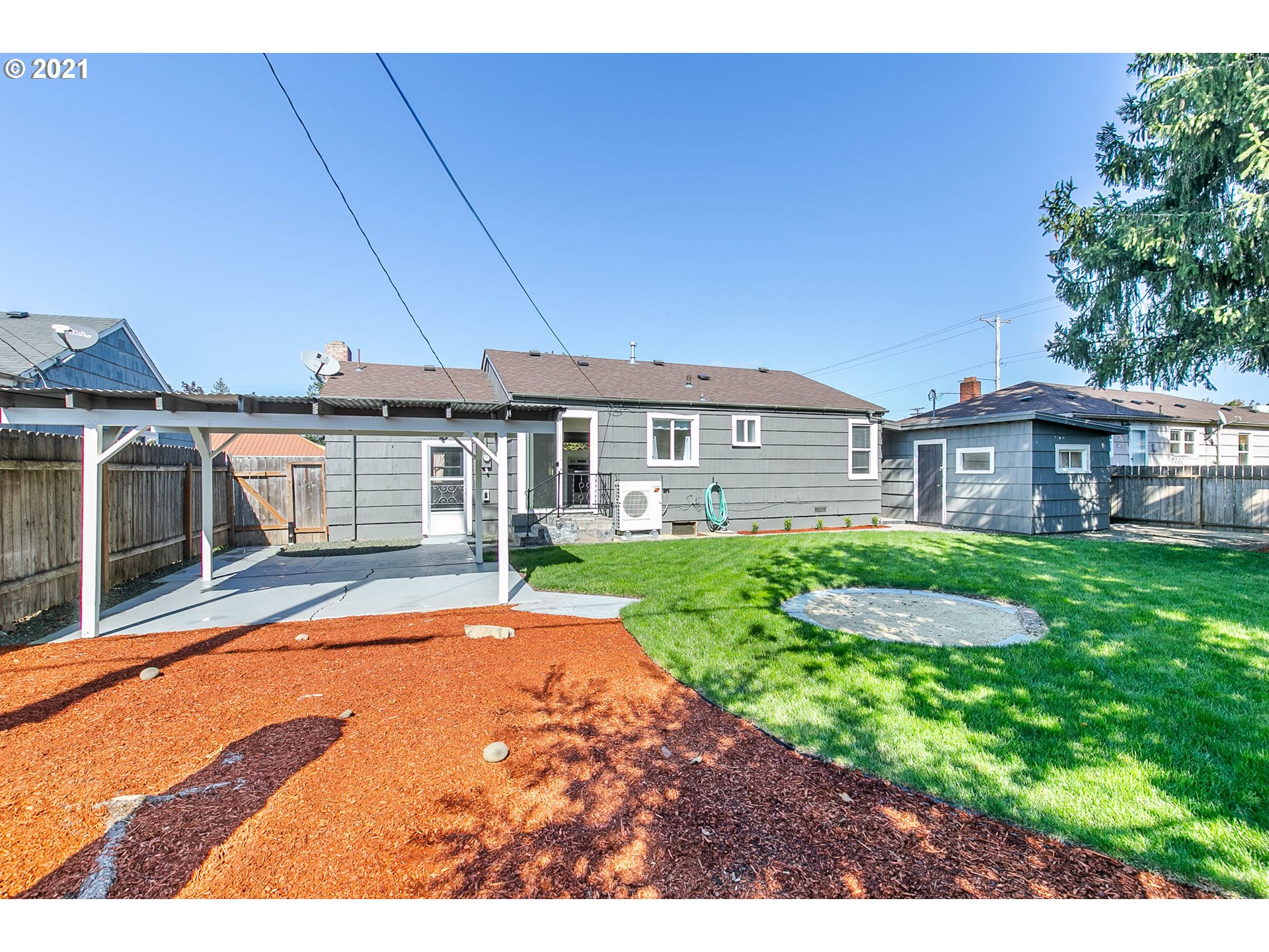 1469 Parker Street Springfield, OR 97477 - Photo 27 of 30 a front view of a house with a yard