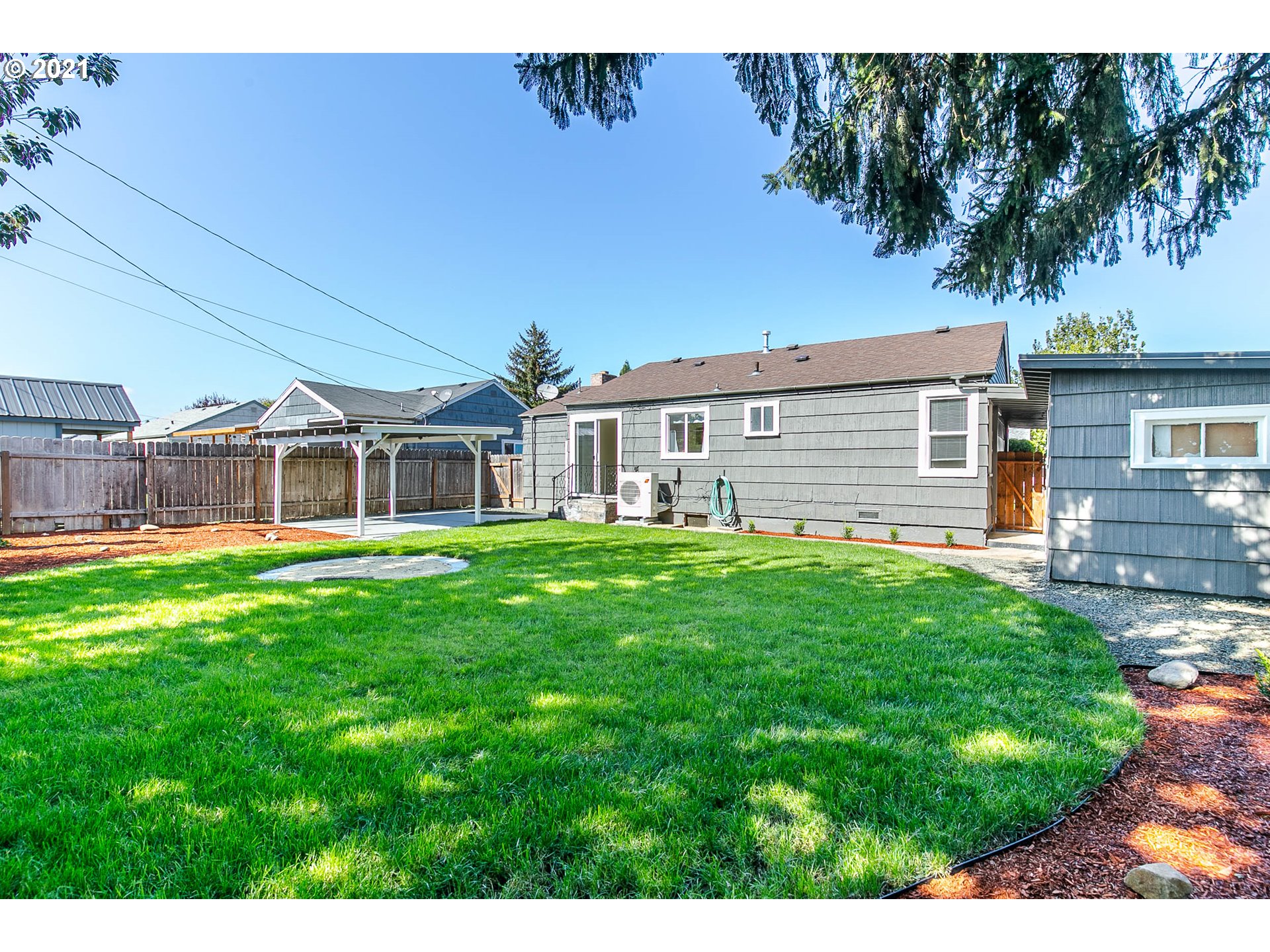 1469 Parker Street Springfield, OR 97477 - Photo 29 of 30 a front view of a house with a garden