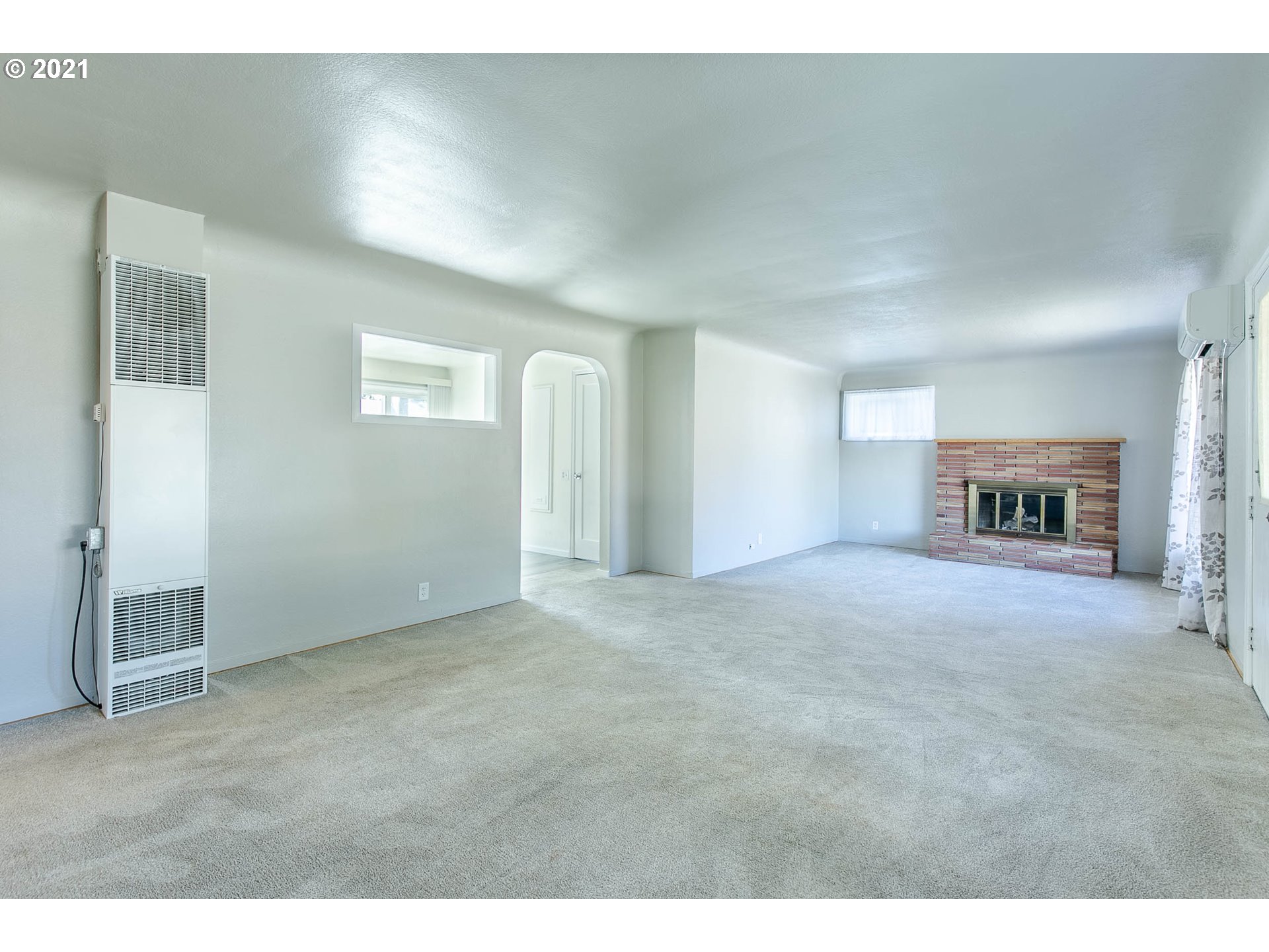 1469 Parker Street Springfield, OR 97477 - Photo 8 of 30 a view of empty room with a fireplace
