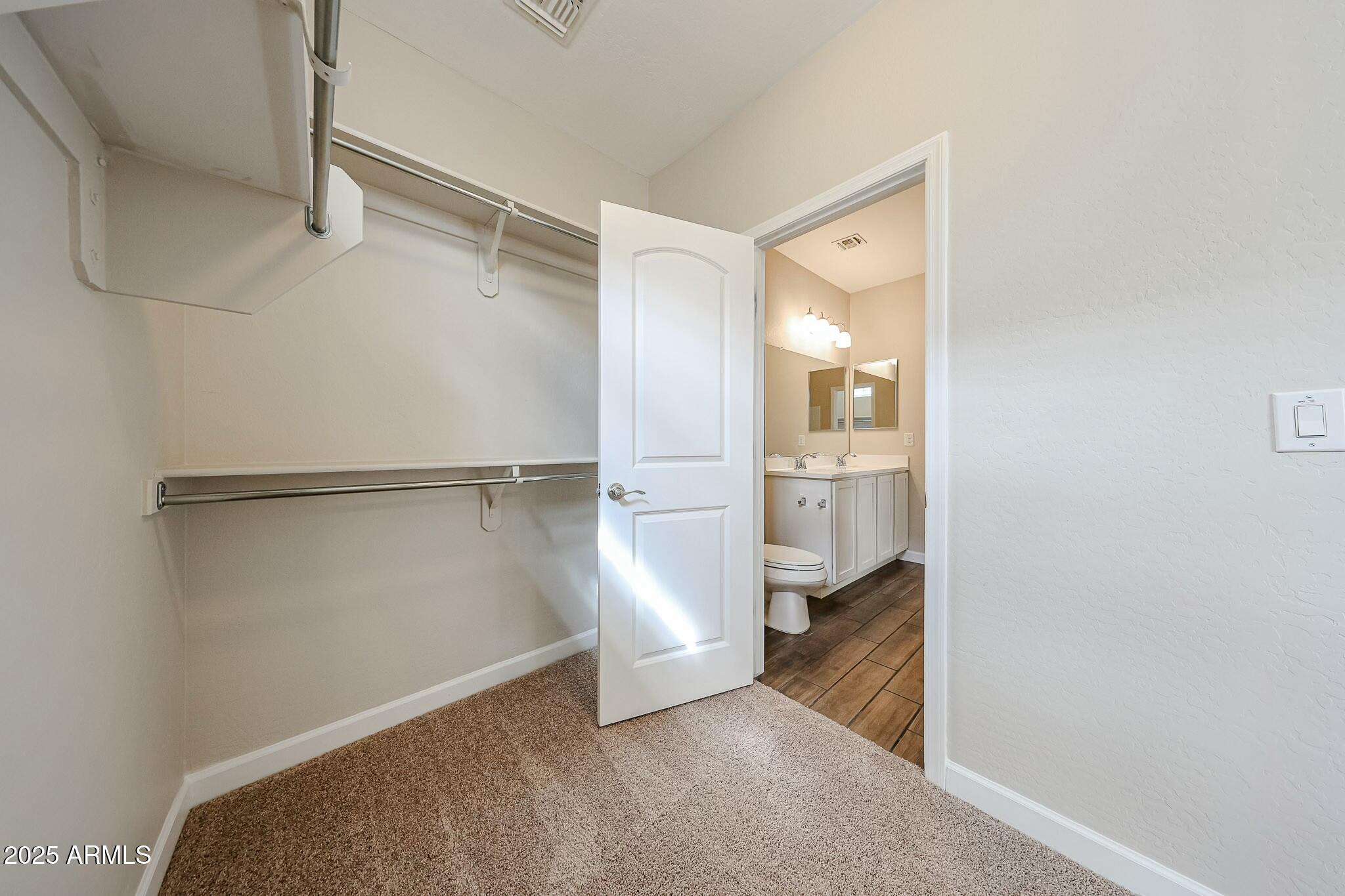 2150 West Alameda Road, Unit 1122 Phoenix, AZ 85085 - Photo 22 of 25 primary closet
