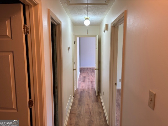 2395 High Falls Road Griffin, GA 30223 - Photo 11 of 20 a view of a hallway with wooden floor