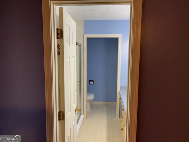 2395 High Falls Road Griffin, GA 30223 - Photo 15 of 20 a view of a bathroom from a hallway
