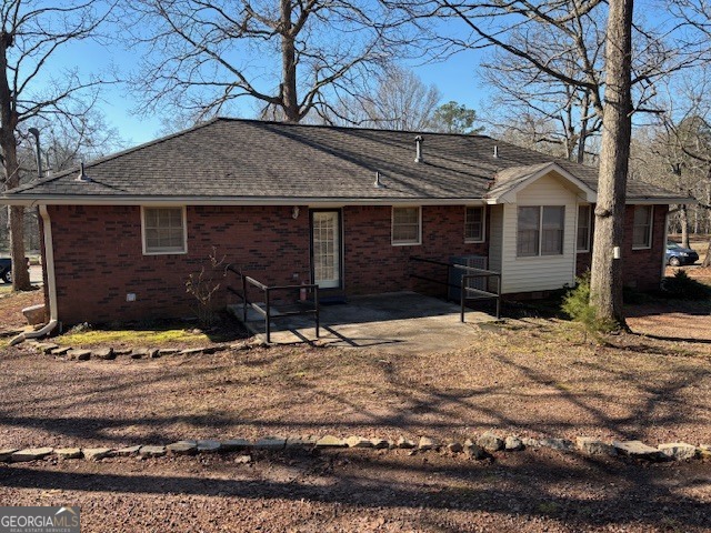 2395 High Falls Road Griffin, GA 30223 - Photo 19 of 20 a front view of a house with a yard covered in snow