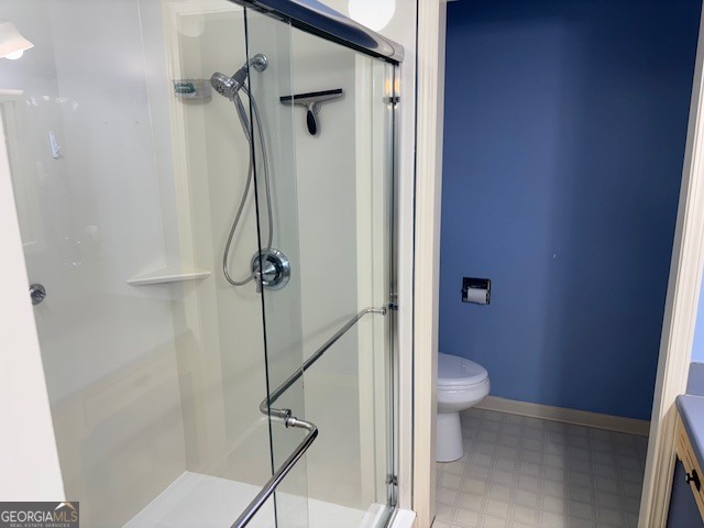 2395 High Falls Road Griffin, GA 30223 - Photo 8 of 20 a bathroom with a shower and a toilet