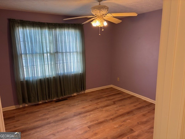 2395 High Falls Road Griffin, GA 30223 - Photo 9 of 20 an empty room with windows
