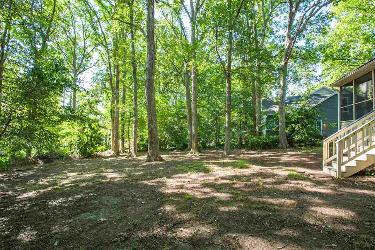 8816 Woodstone Drive Raleigh, NC 27615 - Photo 30 of 30 Large wooded back yard with plenty of open space. Back Yard