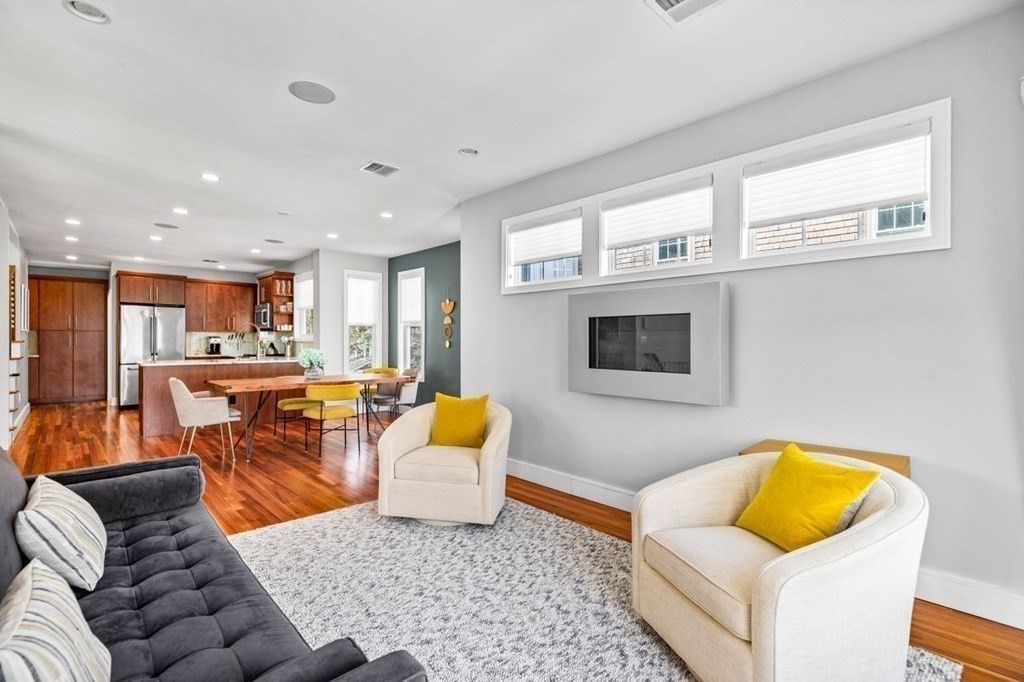 80 Summit Avenue, Unit 80 Brookline, MA 02446 - Photo 15 of 41 a living room with furniture and a couch