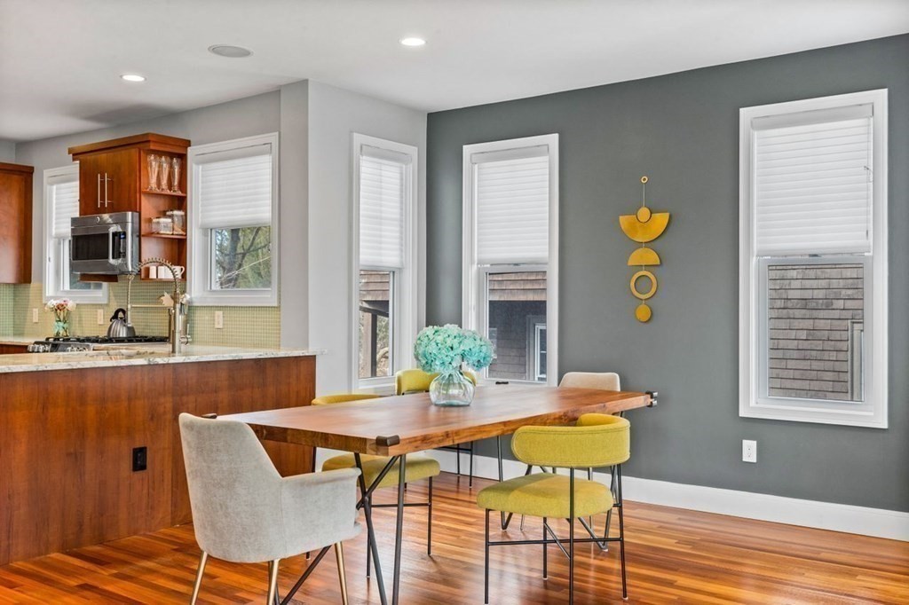 80 Summit Avenue, Unit 80 Brookline, MA 02446 - Photo 18 of 41 a view of a dining room with furniture and wooden floor