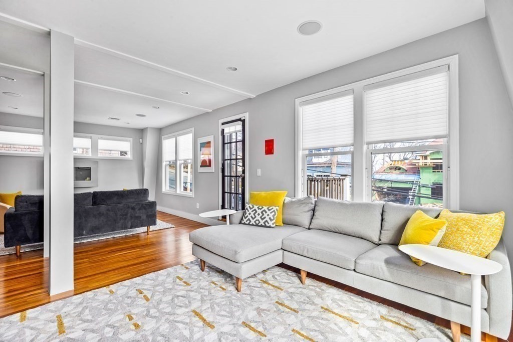 80 Summit Avenue, Unit 80 Brookline, MA 02446 - Photo 19 of 41 a living room with furniture and a rug