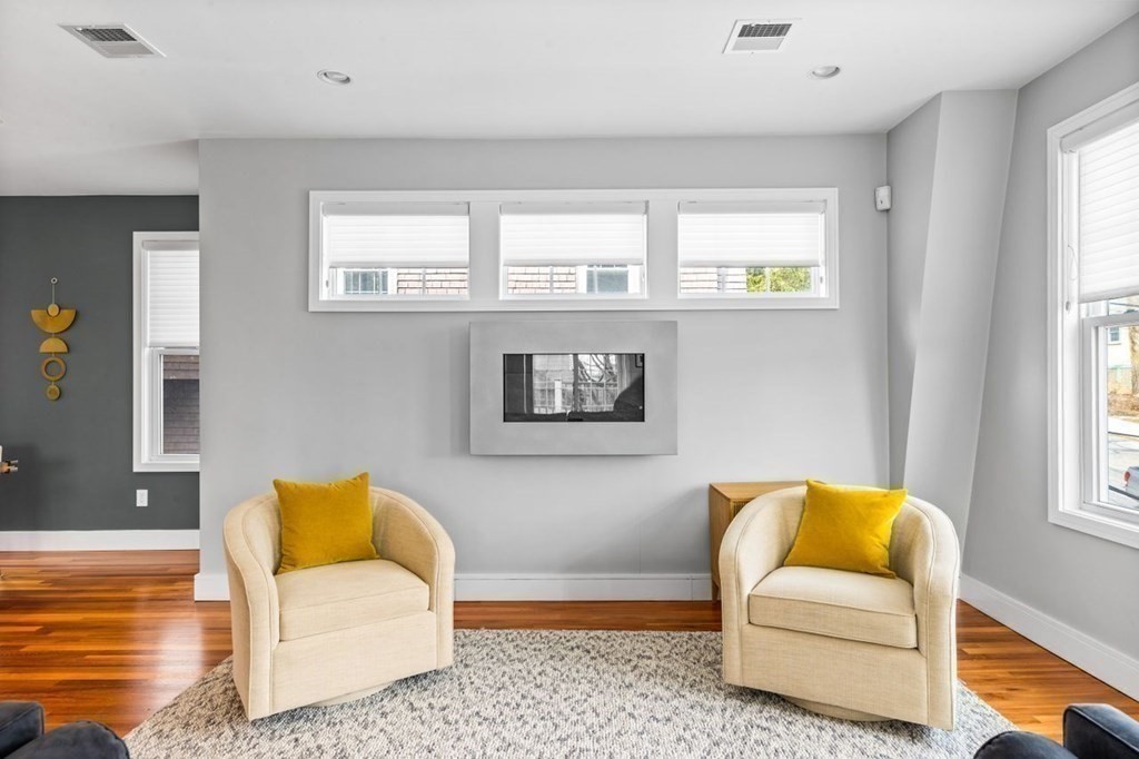 80 Summit Avenue, Unit 80 Brookline, MA 02446 - Photo 20 of 41 a living room with furniture and a couch