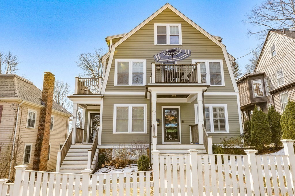 80 Summit Avenue, Unit 80 Brookline, MA 02446 - Photo 2 of 41 a front view of a house with a porch
