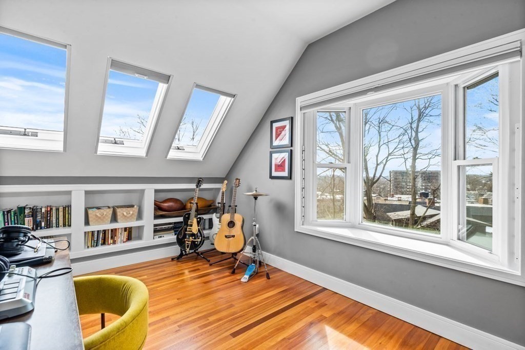 80 Summit Avenue, Unit 80 Brookline, MA 02446 - Photo 23 of 41 a living room with furniture and a window