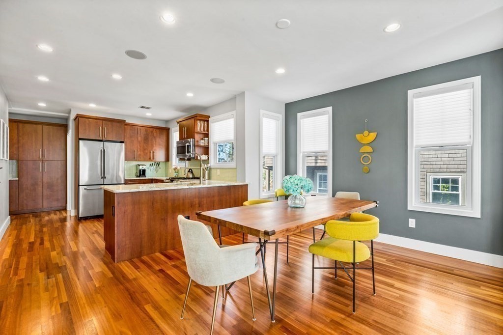 80 Summit Avenue, Unit 80 Brookline, MA 02446 - Photo 9 of 41 a view of a dining room with furniture window and wooden floor