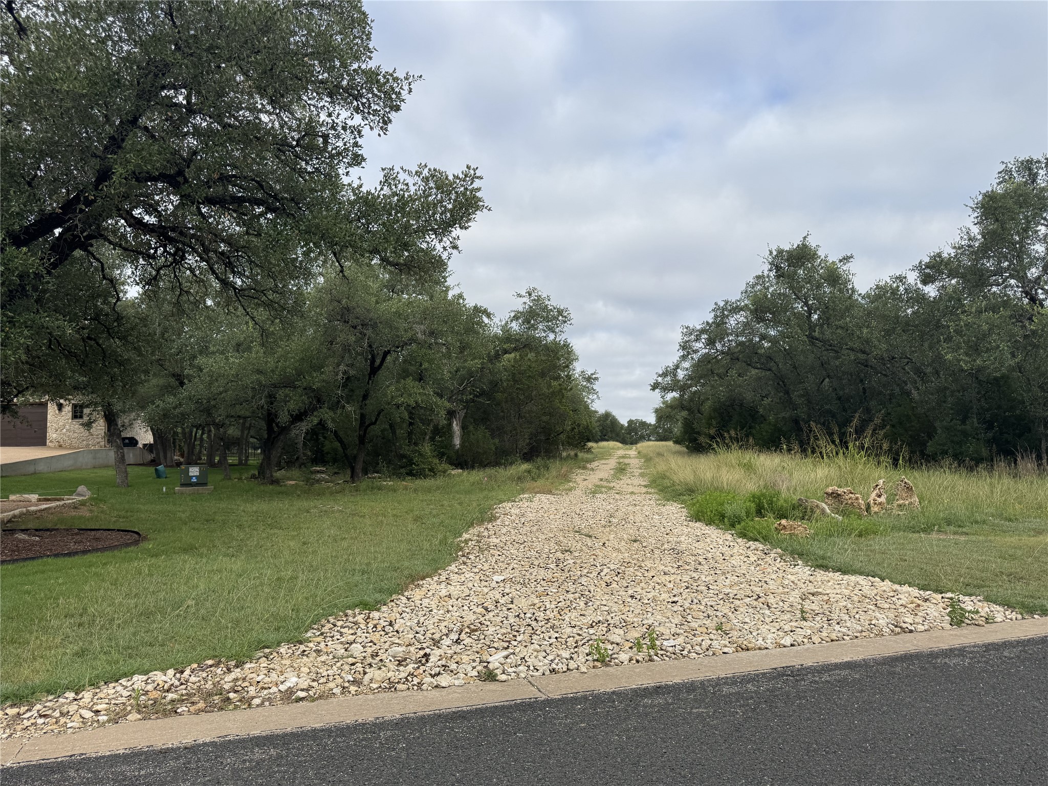 109 Estancia Way Georgetown, TX 78628 - Photo 22 of 22 a view of a park with large trees