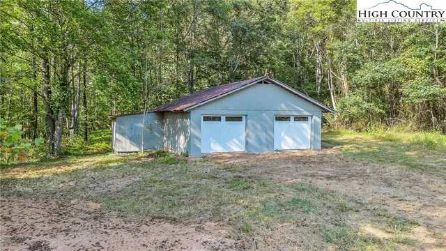 a house with trees in the background