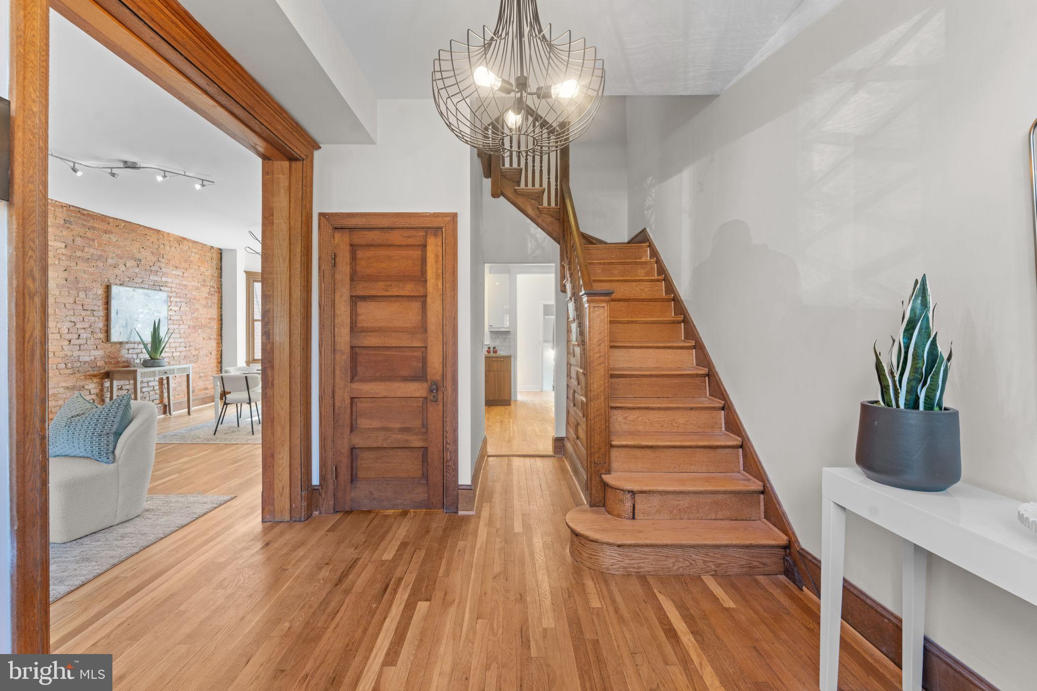 1802 Lamont Street Northwest Washington, DC 20010 - Photo 7 of 118 a view of entryway and hall with wooden floor