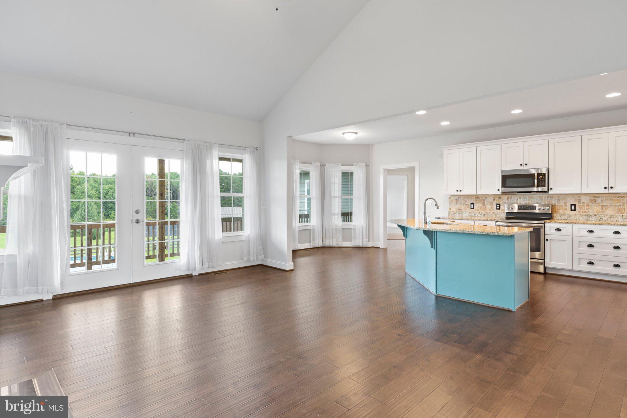 27471 Strawberry Hill Road Rhoadesville, VA 22542 - Photo 3 of 56 FAMILY ROOM INTO KITCHEN