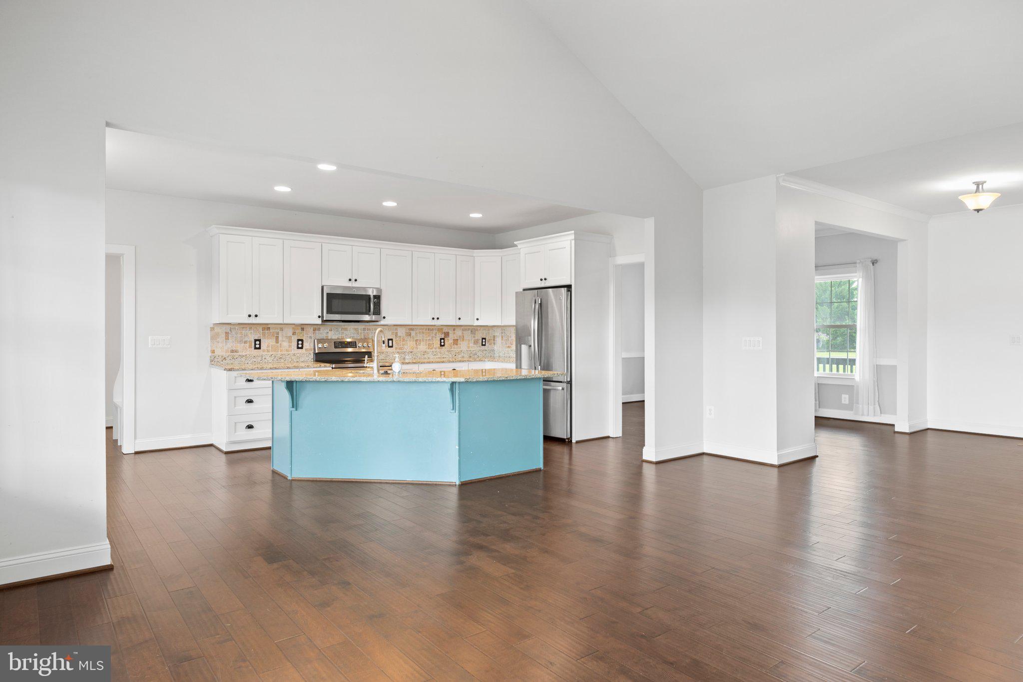 27471 Strawberry Hill Road Rhoadesville, VA 22542 - Photo 4 of 56 FAMILY ROOM INTO KITCHEN