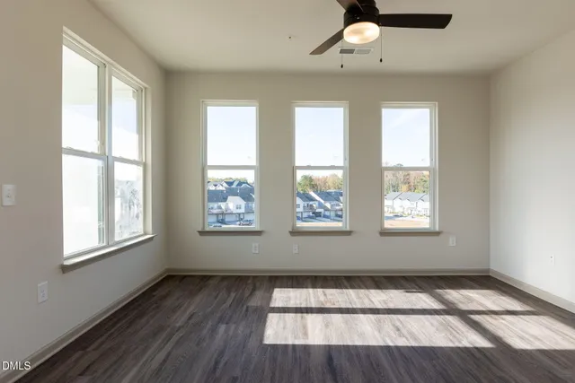 a kitchen with stainless steel appliances kitchen island a refrigerator sink and stove