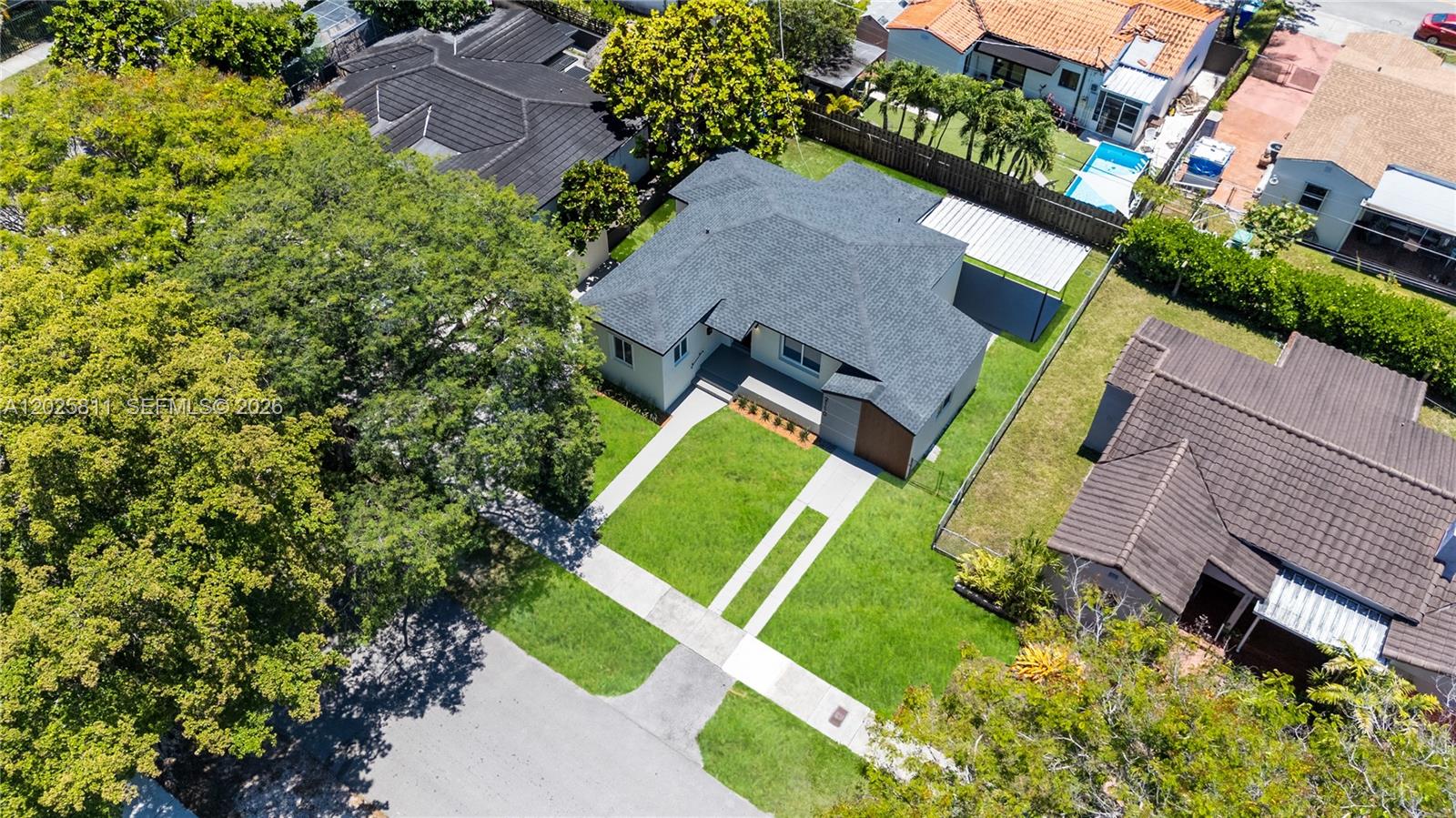 2110 Southwest 15th Street Miami, FL 33145 - Photo 34 of 37 an aerial view of a house with a garden and swimming pool