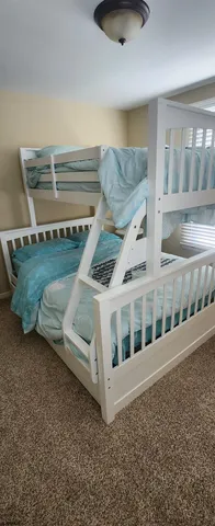 a view of a room with a large window