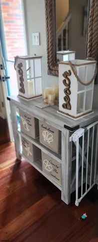 a stove top oven sitting inside of a kitchen
