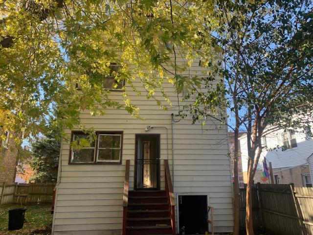 820 Elgin Avenue Forest Park, IL 60130 - Photo 11 of 20 a front view of a house with a tree