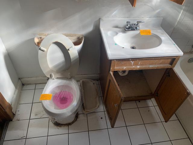 820 Elgin Avenue Forest Park, IL 60130 - Photo 7 of 20 a kitchen with a sink and cabinets