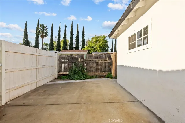 a view of a house with a street