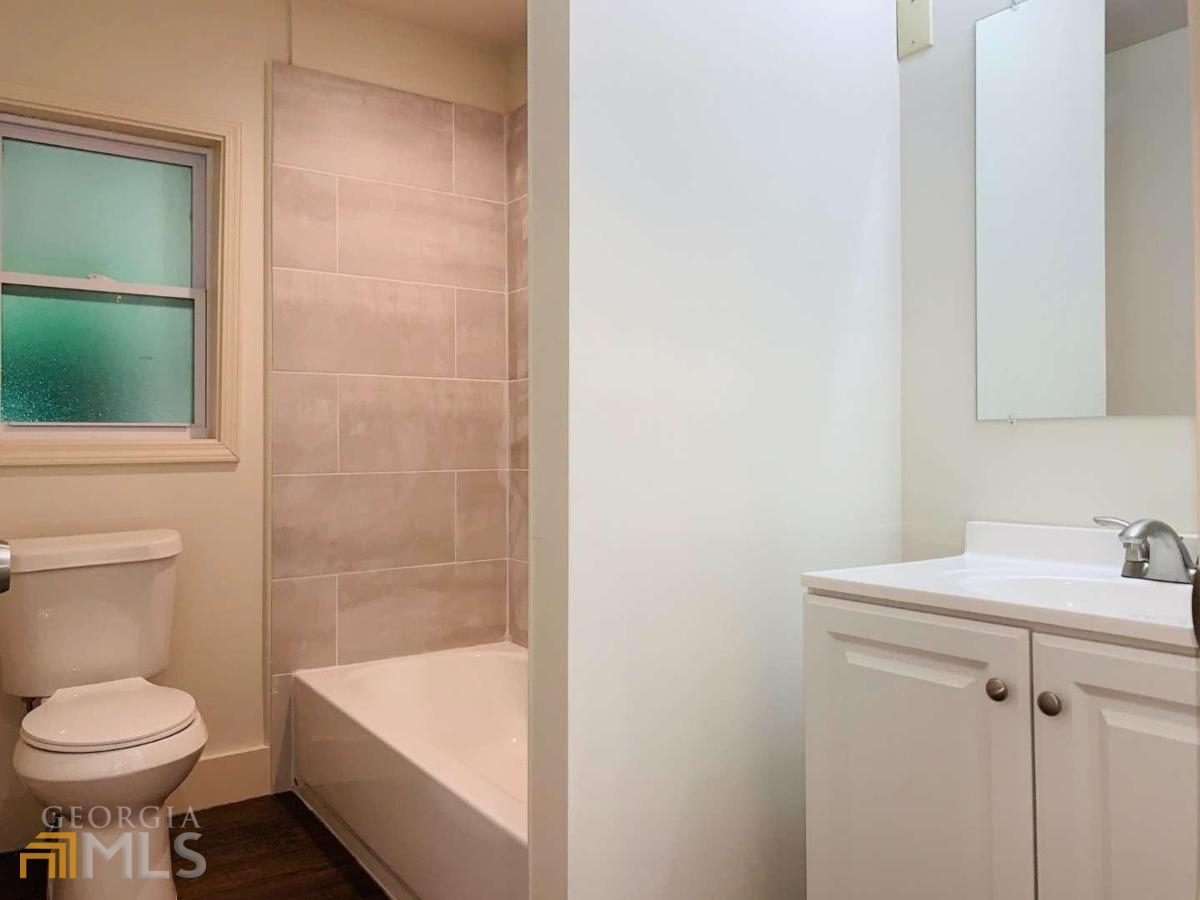 364 Brooks Avenue Southwest Atlanta, GA 30310 - Photo 10 of 21 a bathroom with a sink and a toilet
