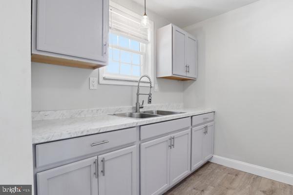 3496 Fox Ridge Court Dover, PA 17315 - Photo 11 of 35 a kitchen with white cabinets and a sink