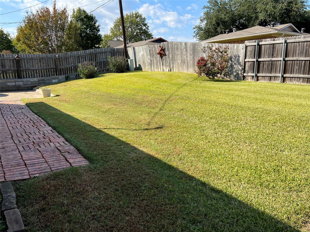 1825 Glenway Drive Sherman, TX 75092 - Photo 21 of 21 a view of a house with a yard