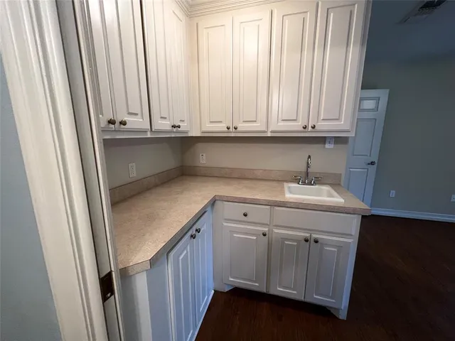 a utility room with a sink