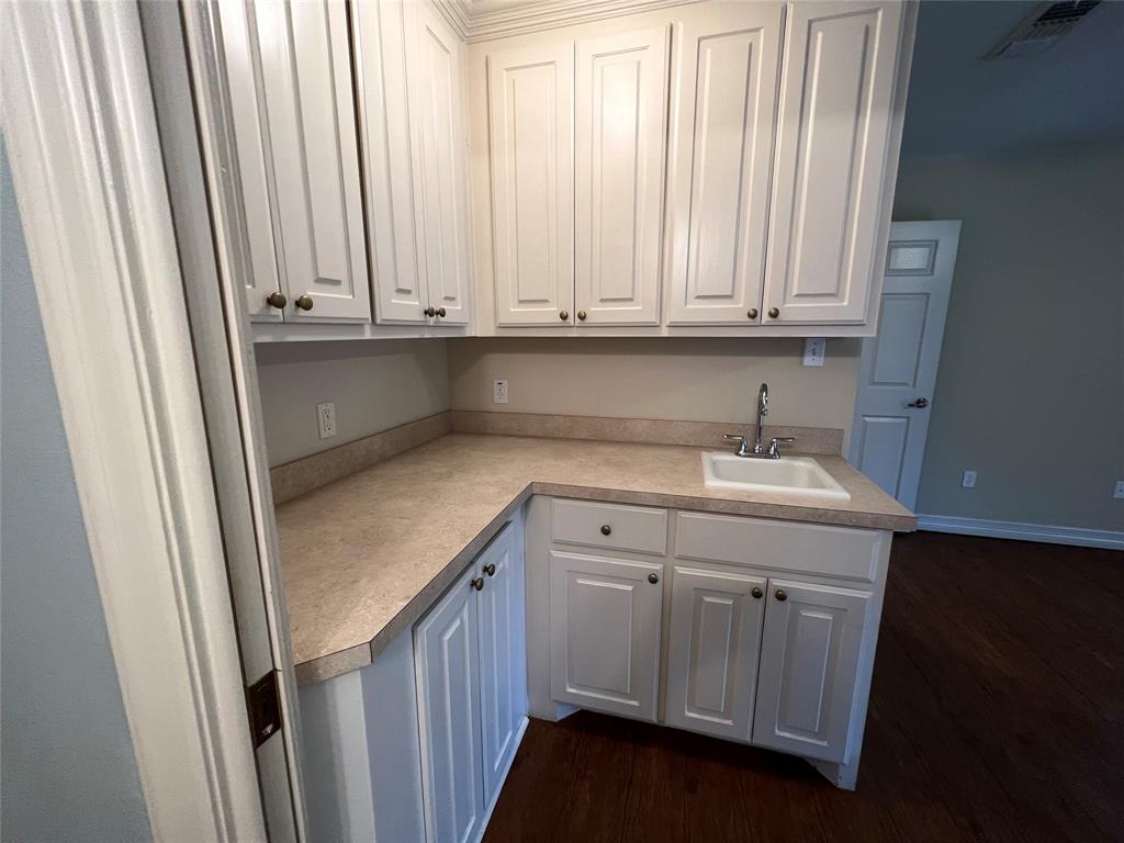 1825 Glenway Drive Sherman, TX 75092 - Photo 9 of 21 a utility room with a sink