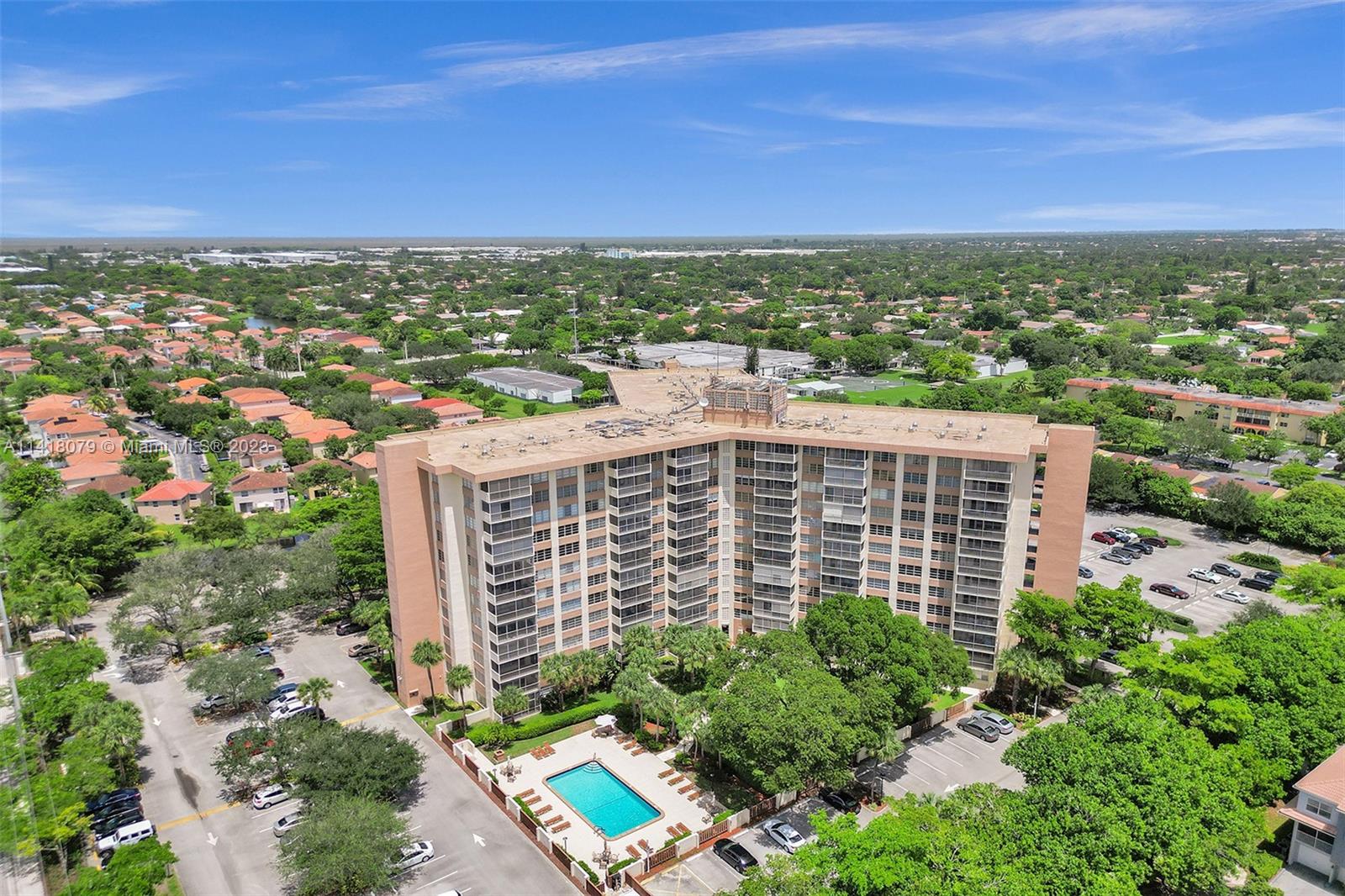 10777 West Sample Road, Unit 614 Coral Springs, FL 33065 - Photo 2 of 40 a view of a city with tall buildings