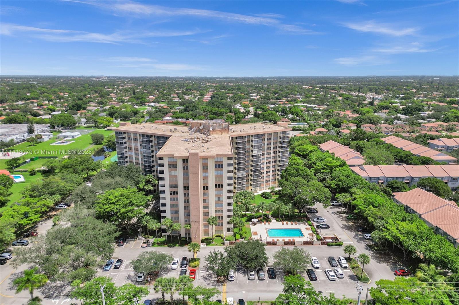 10777 West Sample Road, Unit 614 Coral Springs, FL 33065 - Photo 3 of 40 a view of a city with tall buildings