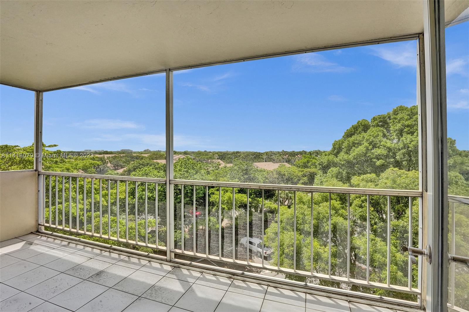 10777 West Sample Road, Unit 614 Coral Springs, FL 33065 - Photo 34 of 40 a view of a city from a balcony