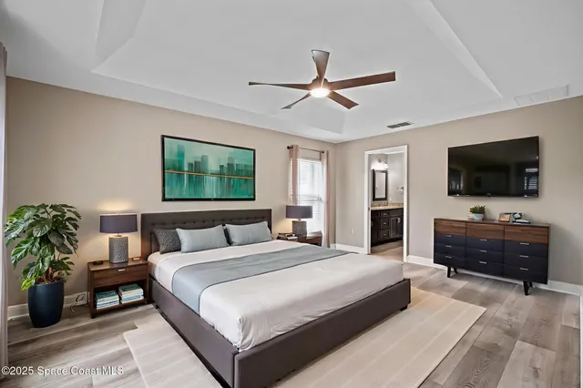 a bathroom with double sink and a mirror