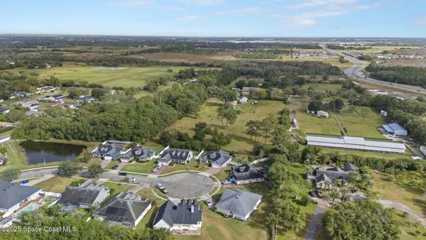 an aerial view of a city with lots of residential buildings