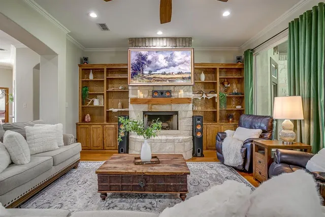 a view of a dining room with furniture wooden floor and chandelier