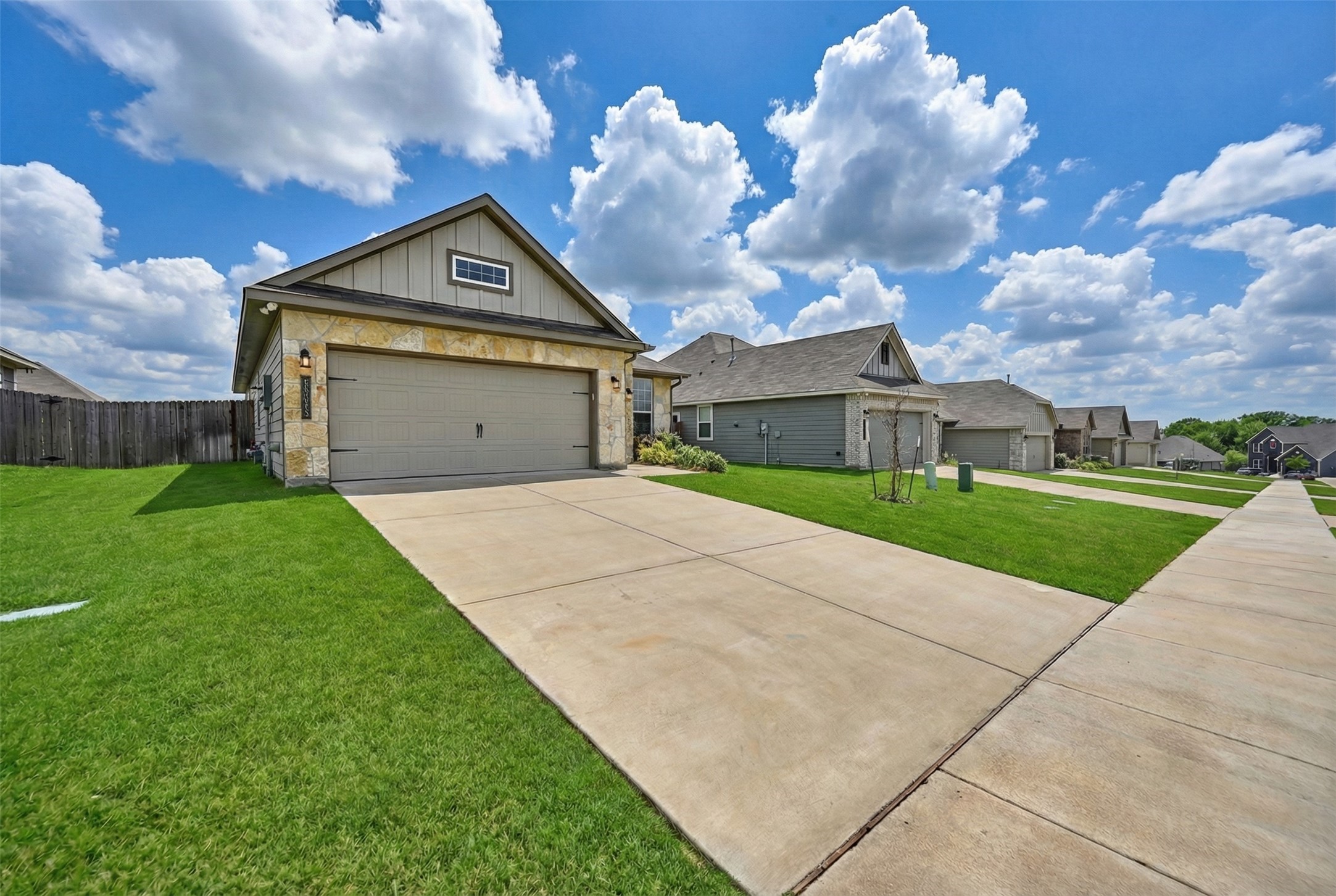1443 Lk Rdg Drive Brenham, TX 77833 - Photo 3 of 17 a view of a house with a yard
