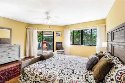 a bathroom with a shower a toilet and a sink