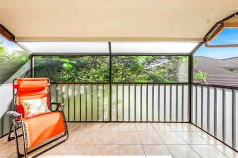 a balcony view with a garden